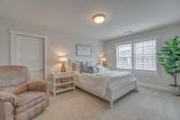 Spacious upstairs bedroom with a walk-in closet.