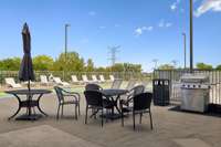 Again, steps away from the unit is the gated pool area & grill.  The convenience of this unit is amazing... no stairs to any of the common areas & it is located very close to both the club room & pool areas.