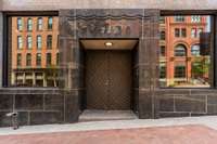 The two-story street-level guest house can host personal guests, Airbnb guests, or be converted into a retail space, event space, or coffee shop. With a prime location and flexible zoning, the options are endless.