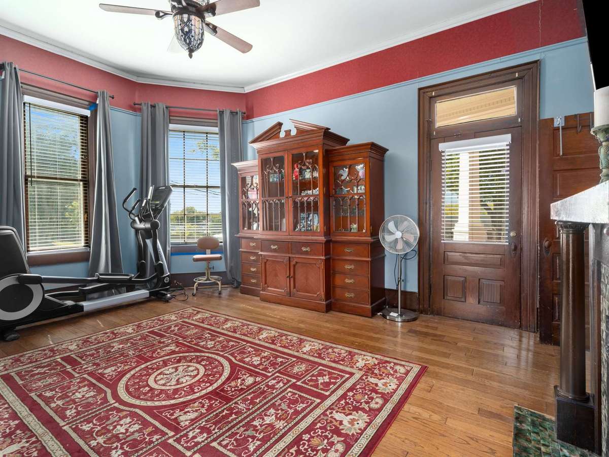 This room also contains an exterior door to the front porch.