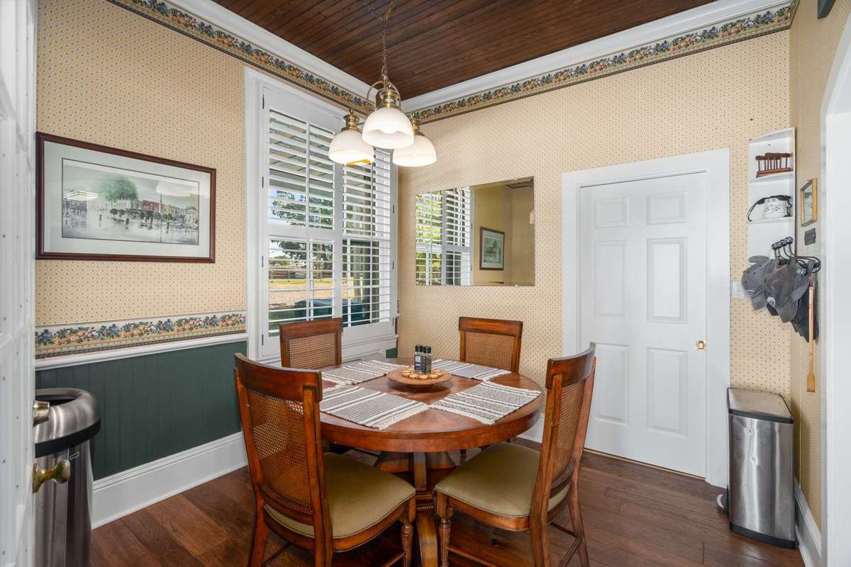 Breakfast nook - door leads to laundry/utility room. This window is the only functional (opening/closing) window on the main floor.