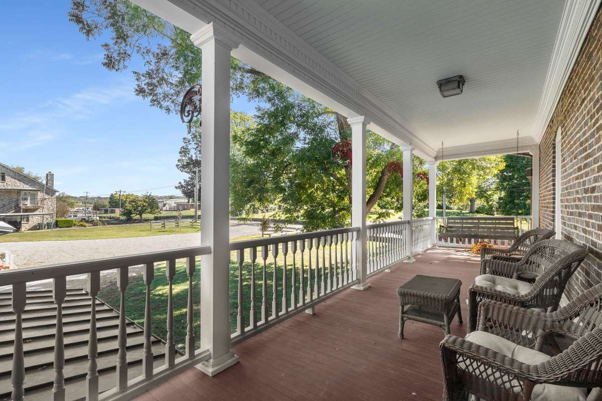 Covered upper back porch.