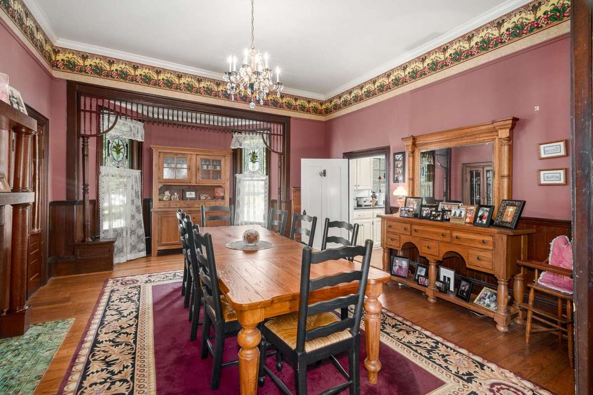 Dining room with ornate wood and built-ins
