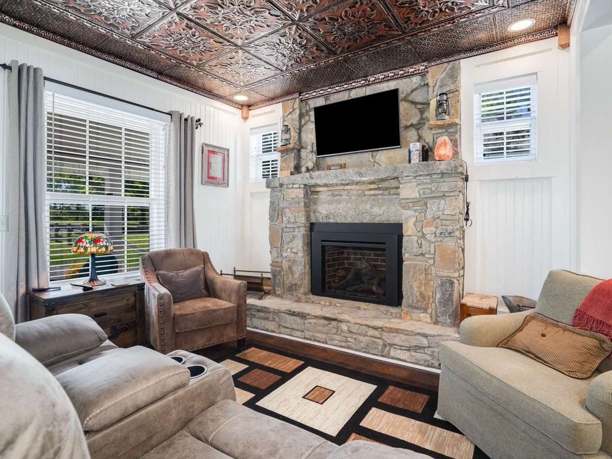 Stone fireplace with sealed gas unit.