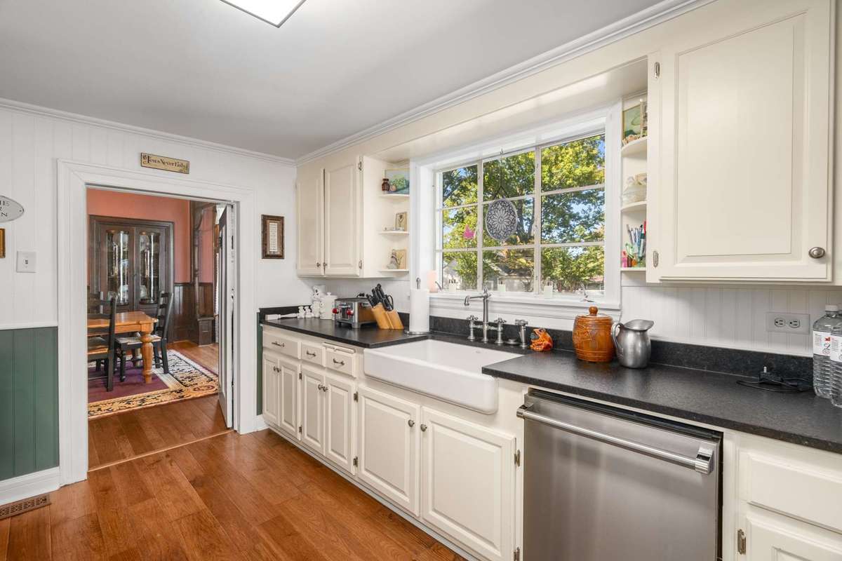 Kitchen renovation to include large cast iron sink and Viking dishwasher.