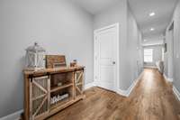 Open Foyer with coat closet/storage