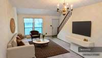Combination Living Room/Dining Room with carpet and loft ceiling; Very nice open floor plan easily flows throughout the home