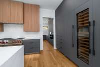 The Sub-Zero cabinet front freezer/wine column/refrigerator is sleek and minimal.