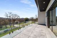 Elevated concrete deck off the main living room with views for miles.