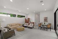 The tiled family room functions as the "pool house" for ideal indoor/outdoor living.