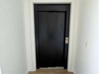 Motorized elevator doors to all floors