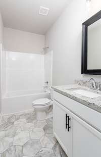 Bathroom #2 with Granite Countertops and a Tub/Shower Combo