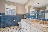 Nice colors in this bathroom. Includes double vanities!
