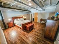 Upstairs loft BR with closet & adjoining bath.