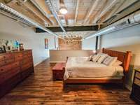 Another view of the spacious loft BR.