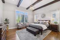 The primary bedroom suite on the main floor provides quiet and rest away from the main living area.