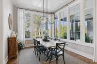 The eat-in kitchen area connects the kitchen to the outdoor patio.
