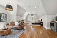 The recent 2024 addition of the sixth bedroom with ensuite and a studio sitting area.