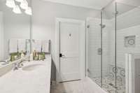 Bath 3 has a huge walk-in closet and walk-in attic storage space.