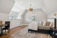 Custom built-in drawers fit the room nicely without adding extra furniture.