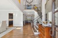 A warm welcome into the two-story foyer.