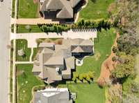 The home, the landscape, the driveway- all have been custom designed for comfortable, luxurious living.