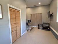 Br 3 / Home Office is tucked away for privacy. Laundry area in the closet.