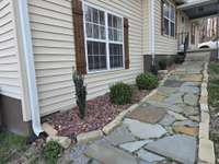 Beautiful New Landscaping and Sidewalk.