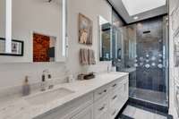 Luxury Finishes in primary bath with separate water closet.