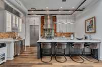 Gourmet kitchen with wine bar...