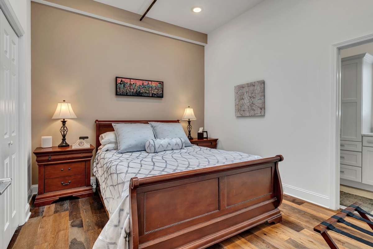 Guest Bedroom includes attached bath and closet with custom built-ins. + SKYLIGHT!