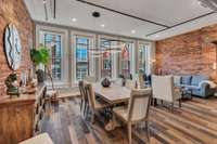 Expansive living area with hardwood floors and soaring ceilings...