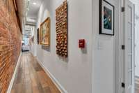 The Art Corridor leading to the Primary Suite...