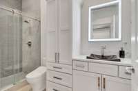 Guest Bath  TOTO toilets are universally recognized as the best in the world.