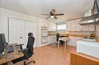 2nd kitchen (for in law suite or airbnb) being used as an office