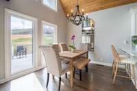 Dining area with views and natural light, plus walkout to the freshly updated deck area right off the kitchen!