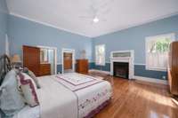One of two primary suites on the main floor with ensuite bathroom and walk-in closet.  This one also has a fireplace!