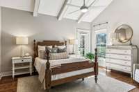 Vaulted ceiling, beams and patio access