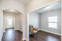 Foyer to welcome your guests...the other room is an office area...