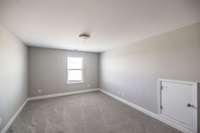 Bonus room upstairs w/a small area that is floored for storage along the wall...