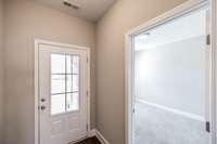 Second bedroom right off the foyer...
