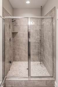 Walk-in shower in owner's retreat