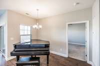 This is the dining area that is being used as a music space....
