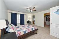 Guest bedroom 1 is large with a huge walk in closet and en suite full bathroom