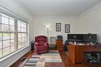To the left of the front door is a secluded room perfect for an office or study