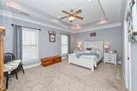 Primary bedroom on main floor with custom closet and bathroom