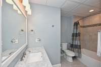 Full bath across the hall in basement