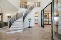 This home went through a two-year renovation by the renowned Walt Brandt, with one of the most notable features being the European oak hardwood flooring that runs throughout the main level, offering timeless warmth and elegance.