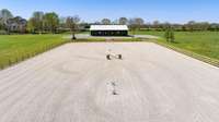 The 250’ x 135’ riding arena has professional-grade EQ-80 footing, ideal for training, lessons, or jumping.
