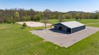 The home’s crown jewel is the state-of-the-art equestrian facility, located at the center of the 56.7-acre property.